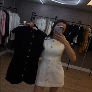 Elegant Black and White Buttoned Dress